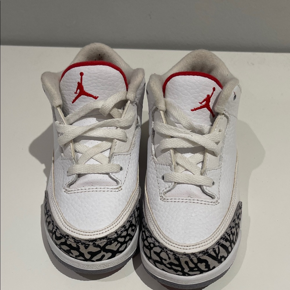 Jordan Kids Sneakers in White with Red Accents and Black Design